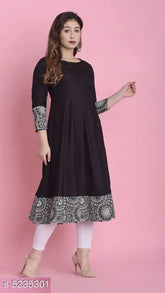 Rayon flared kurti with ethnic motif print on three-quarter sleeves, perfect for women's Indian fashion